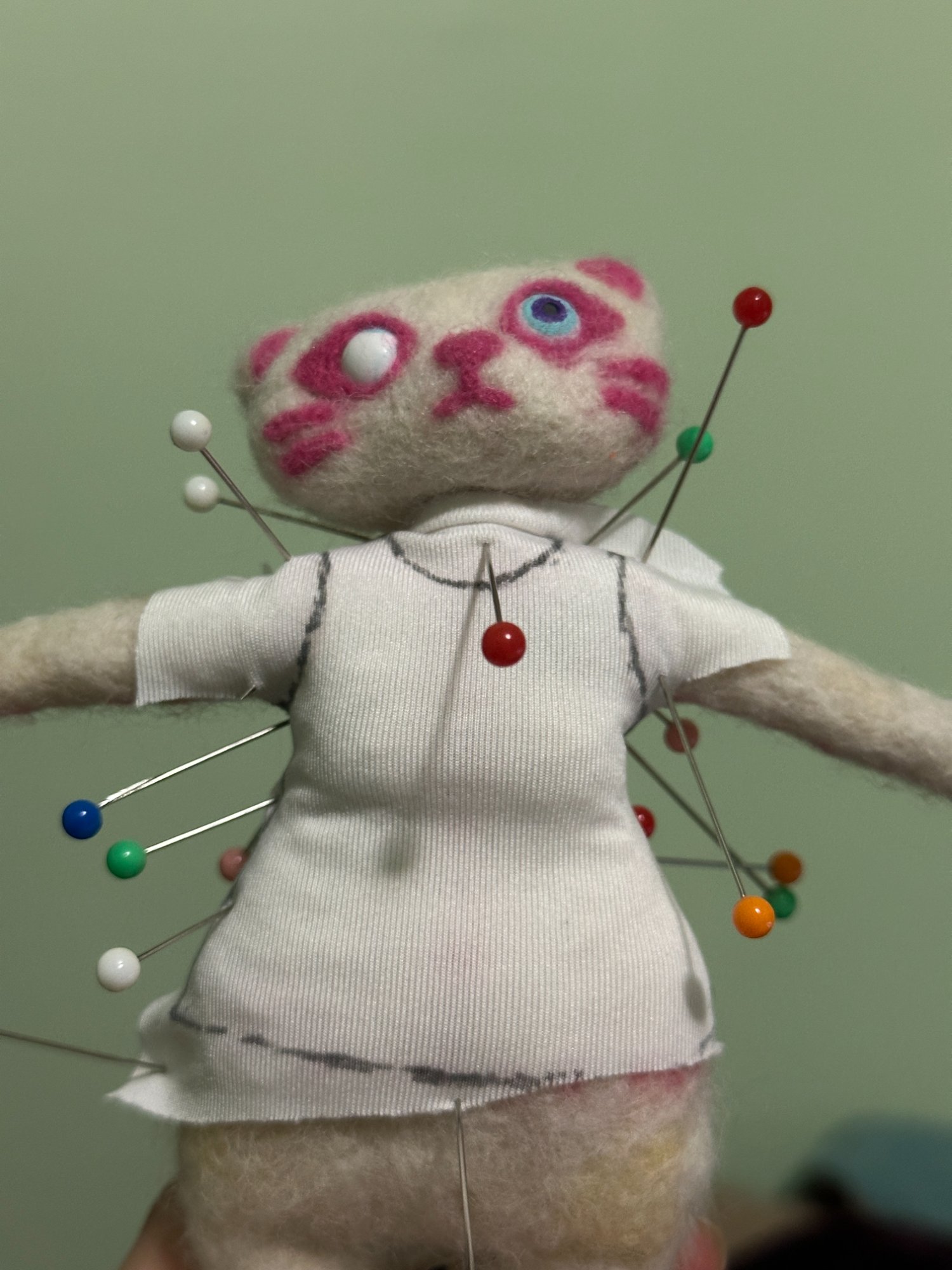 Draping top on maquette with pins