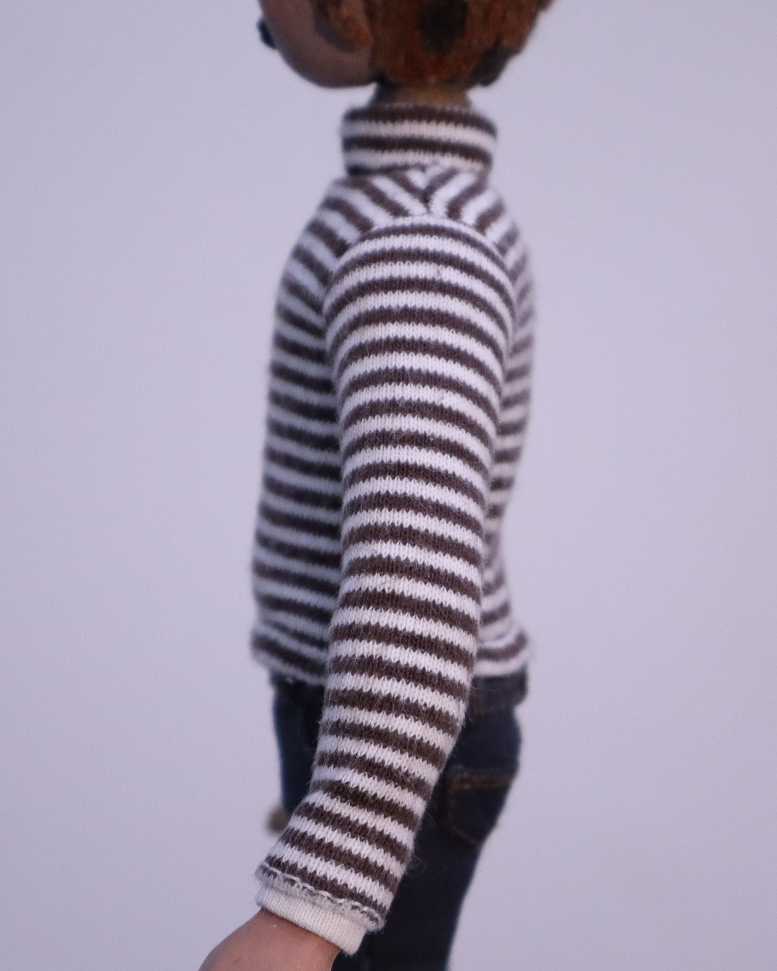 Turtleneck on puppet in scene